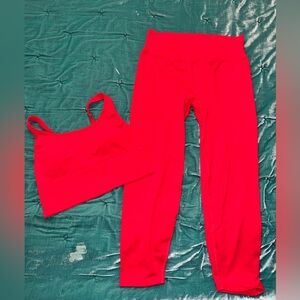 NWOT. PINK sports bra and legging set. Size: Large. Color: Red.